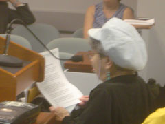 Photo of Frieda Zames testifying at TLC hearing August 2004