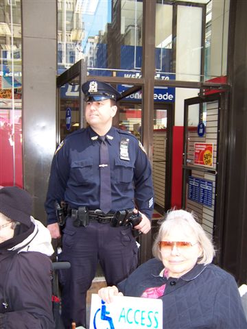 large photo of a cop at the press conference