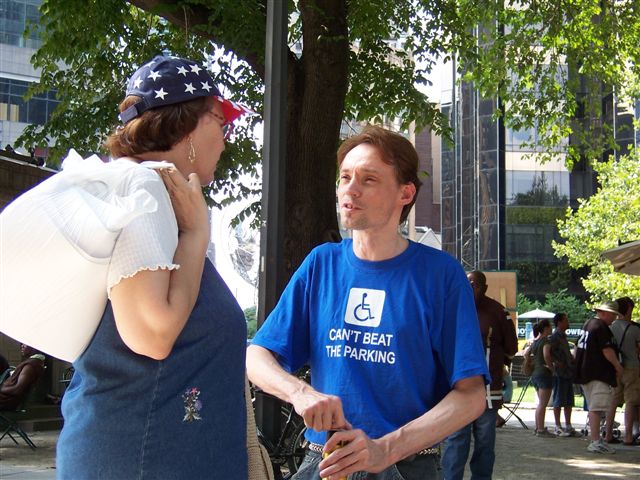 Lawrence Carter-Long talking to one of the DIA singers