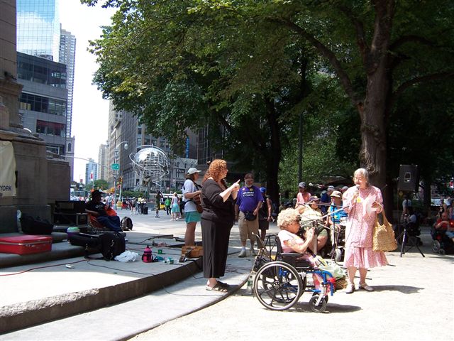 The DIA Singers performing for the crowd at the Americans with Disabilities Act anniversary celebration.