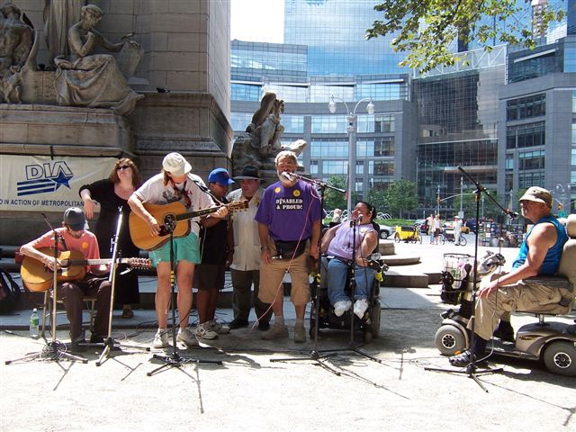 The DIA Singers performing for the crowd at the Americans with Disabilities Act anniversary celebration.