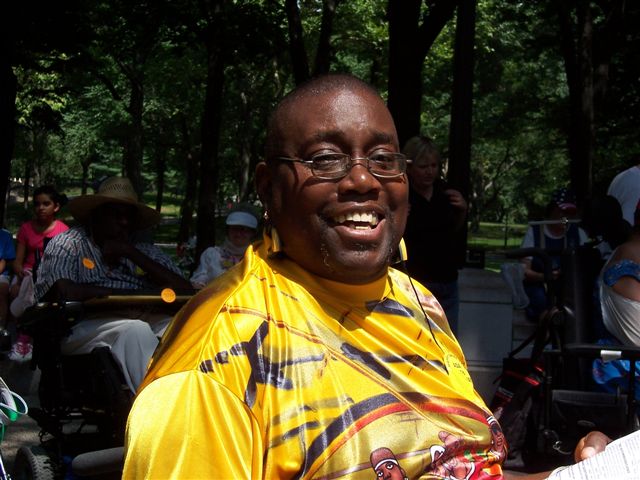 A smiling Toby Edwards at the Americans with Disabilities Act parade