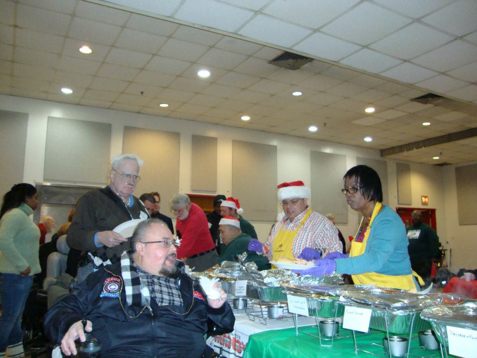 Robert Schoenfeld Handing Out Food