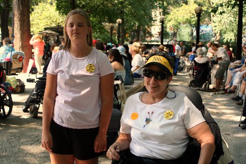 Jean Ryan and Eva wearing buttons on their shirts, reading "Happy Sweet 16th, ADA 2006 Birthday, DIA"