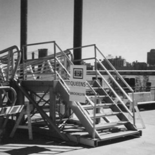 a flight of about 7 big steps at the dock going up to a ferry