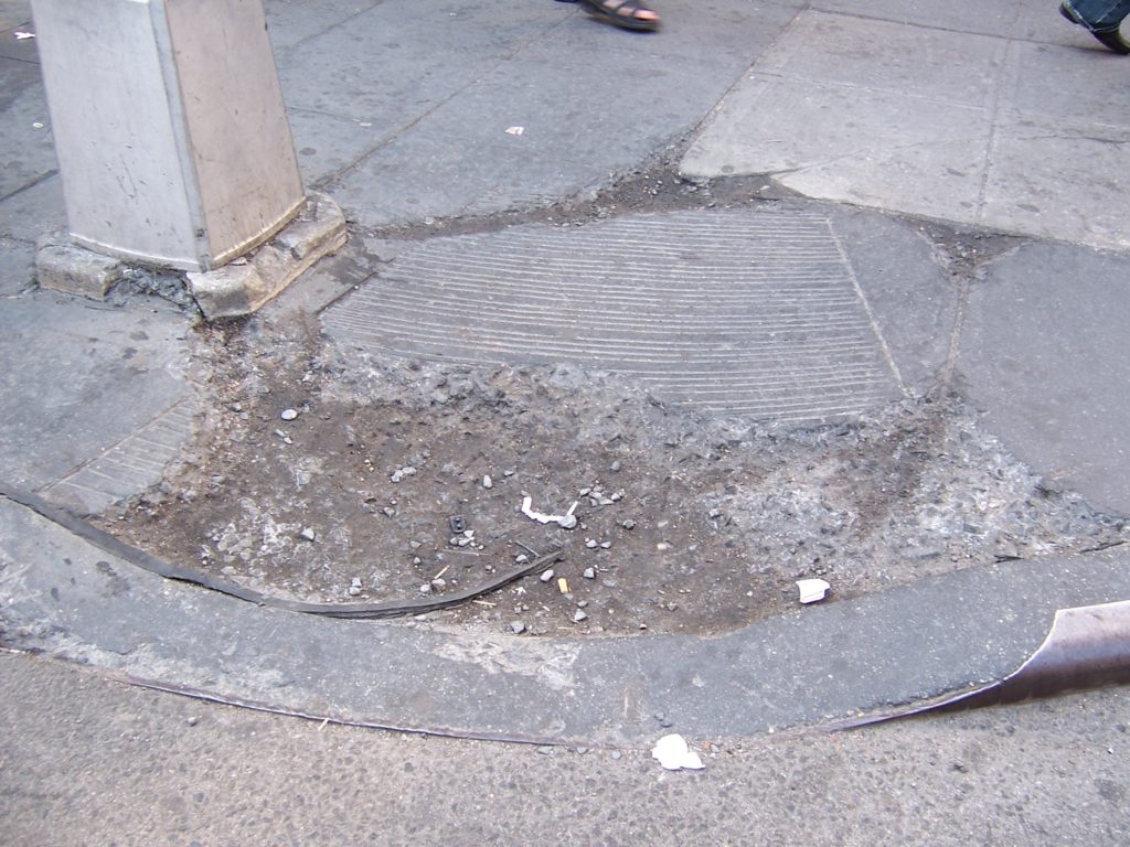 Photo of an eroded curb cut